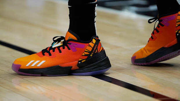 Donovan Mitchell's orange and black shoes.