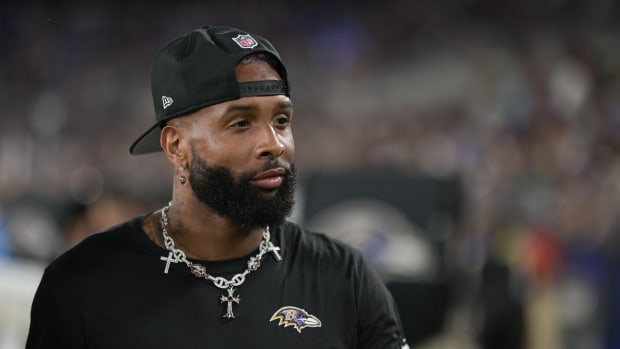 Baltimore Ravens wide receiver Odell Beckham Jr. walks on the sidelines during a game.