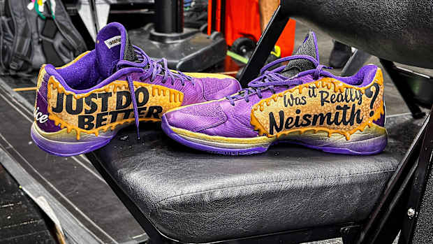 View of Jaylen Brown's purple and brown shoes.