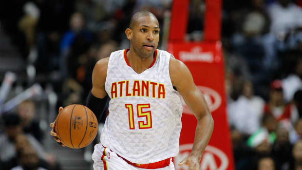 Atlanta Hawks center Al Horford (15) dribbles the ball during the 2014-15 season.