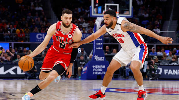 Chicago Bulls guard Zach LaVine dribbles past Detroit Pistons guard Cory Joseph.