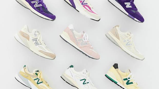View of nine multicolor New Balance sneakers.