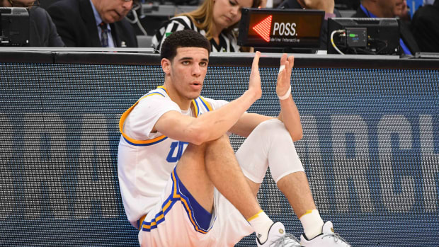 UCLA Bruins guard Lonzo Ball claps during a timeout.