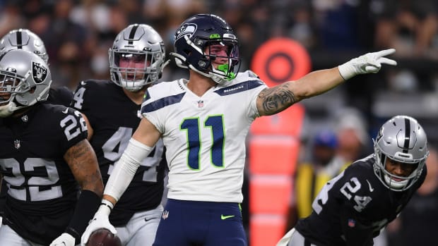 Seattle Seahawks wide receiver Cody Thompson (11) reacts after a first down against the Las Vegas Raiders during the first quarter at Allegiant Stadium.