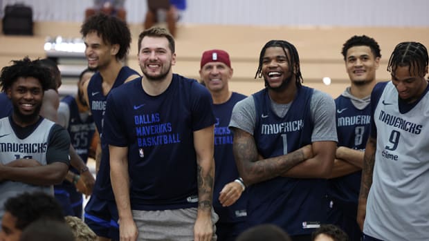 Dallas Mavericks players helping with a youth clinic in NYU Abu Dhabi.