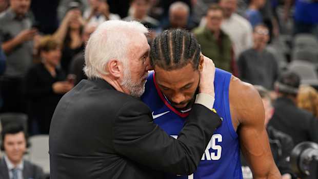 San Antonio Spurs coach Gregg Popovich and Los Angeles Clippers forward Kawhi Leonard
