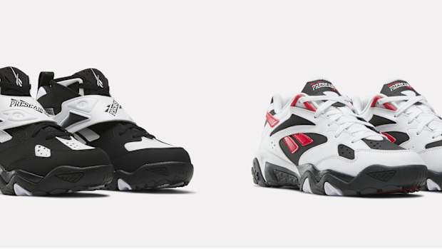 Emmitt Smith's black, white, and Reebok sneakers.