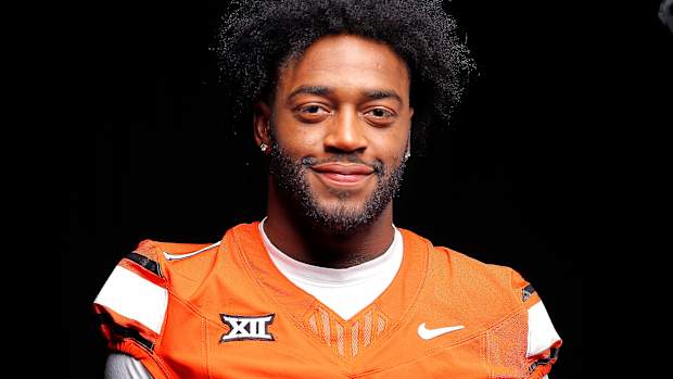 Oklahoma State's Xavier Benson poses for a photograph during media for the Oklahoma State University Cowboys football media days in Stillwater, Okla., Saturday, Aug., 5, 2023.