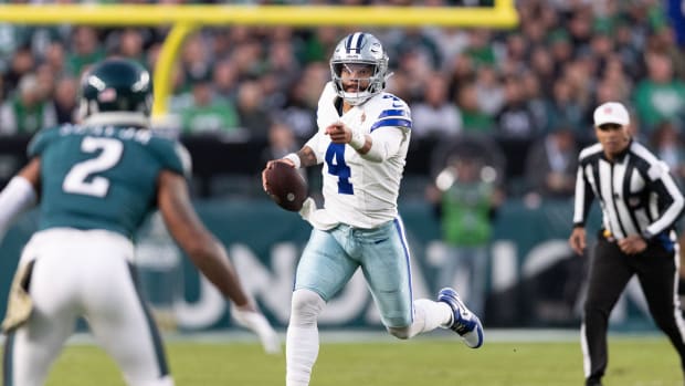 Dallas Cowboys quarterback Dak Prescott runs with the ball against the Philadelphia Eagles.