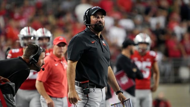Ohio State Buckeyes head coach Ryan Day looks to the scoreboard during the second quarter of the NCAA football game against the Notre Dame Fighting Irish at Ohio Stadium.