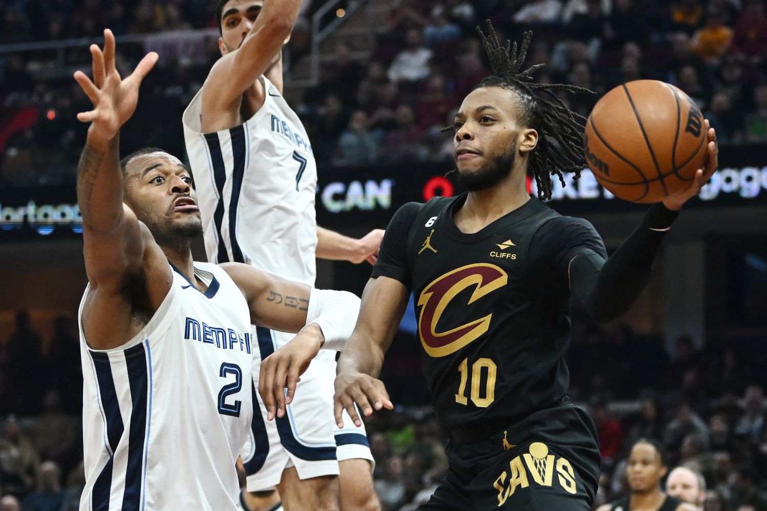 Cleveland Cavaliers guard Darius Garland (10) passes as Memphis Grizzlies forward Xavier Tillman (2) defends during the first half at Rocket Mortgage FieldHouse.