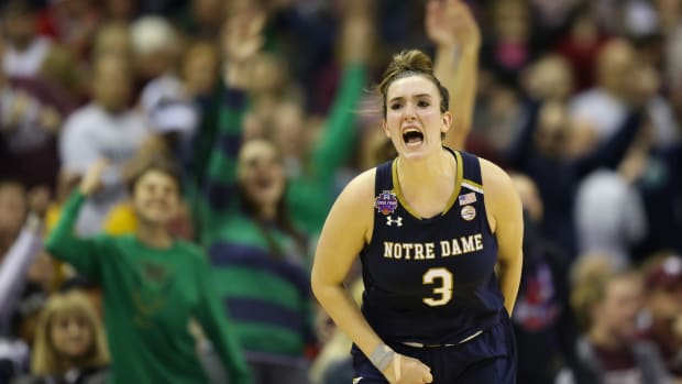 Notre Dame Fighting Irish guard Marina Mabrey celebrates after a made shot.