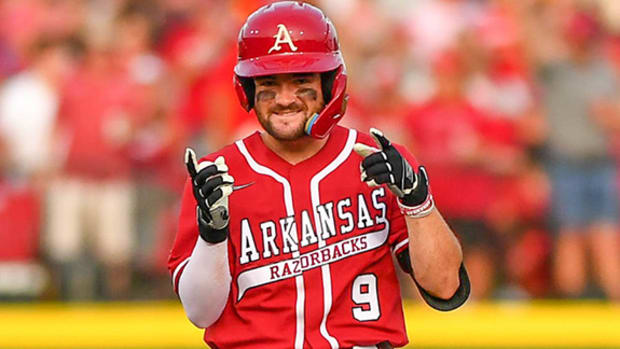The Razorbacks' John Bolton celebrates against South Carolina during a series at Baum Walker Arkansas took 2-1.