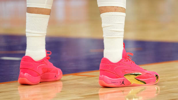Dallas Mavericks guard Luka Doncic's red and gold Jordan Brand sneakers.