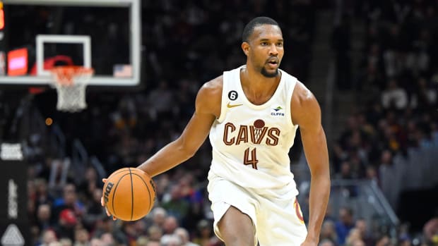 Oct 30, 2022; Cleveland, Ohio, USA; Cleveland Cavaliers forward Evan Mobley (4) dribbles the ball in the third quarter against the New York Knicks at Rocket Mortgage FieldHouse. Mandatory Credit: David Richard-USA TODAY Sports