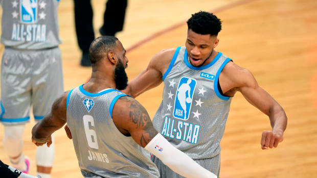 LeBron James and Giannis Antetokounmpo celebrate during 2022 NBA All-Star Game.