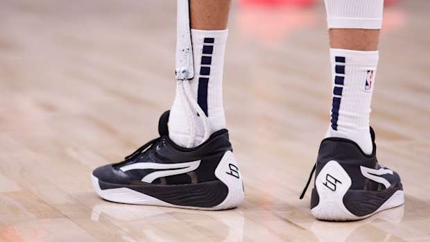 Breanna Stewart's black and white PUMA sneakers.