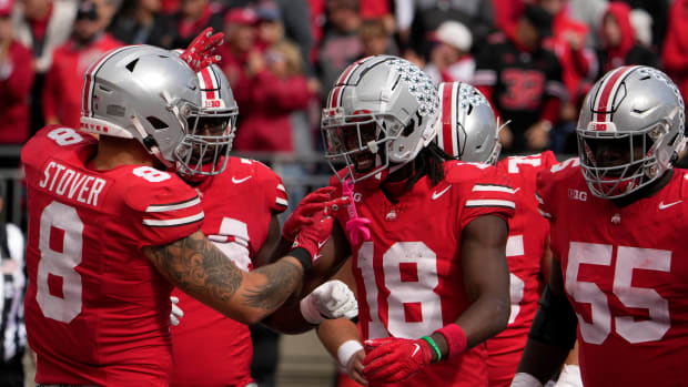 Oct. 7, 2023; Columbus, Oh., USA; Ohio State Buckeyes wide receiver Marvin Harrison Jr. (18) celebrates after scoring a touchdown during the second half of Saturday's NCAA Division I football game against the Maryland Terrapins at Ohio Stadium.