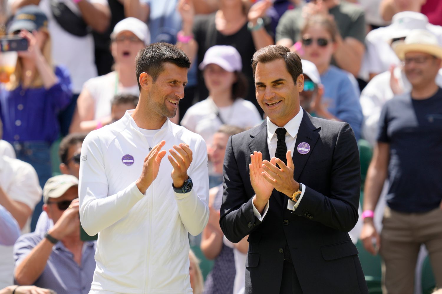 Novak Djokovic and Roger Federer at a Wimbledon ceremony.