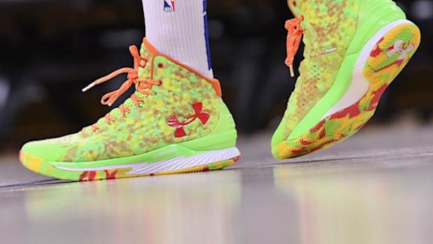 Green and orange Curry shoes.