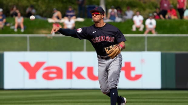 Mar 6, 2023; Tempe, Arizona, USA; Cleveland Guardians second baseman Tyler Freeman (2) makes the play for an out against the Los Angeles Angels in the first inning at Tempe Diablo Stadium. Mandatory Credit: Rick Scuteri-USA TODAY Sports