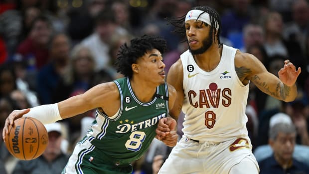 Mar 4, 2023; Cleveland, Ohio, USA; Detroit Pistons guard Jared Rhoden (8) drives against Cleveland Cavaliers forward Lamar Stevens (8) in the fourth quarter at Rocket Mortgage FieldHouse. Mandatory Credit: David Richard-USA TODAY Sports