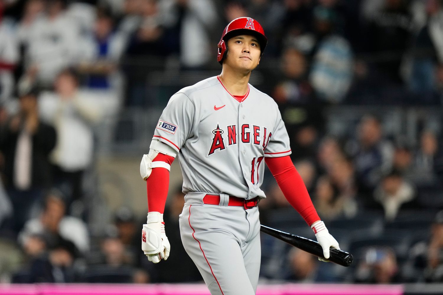Shohei Ohtani reacts after striking out during the seventh inning of a game against the Yankees in New York.