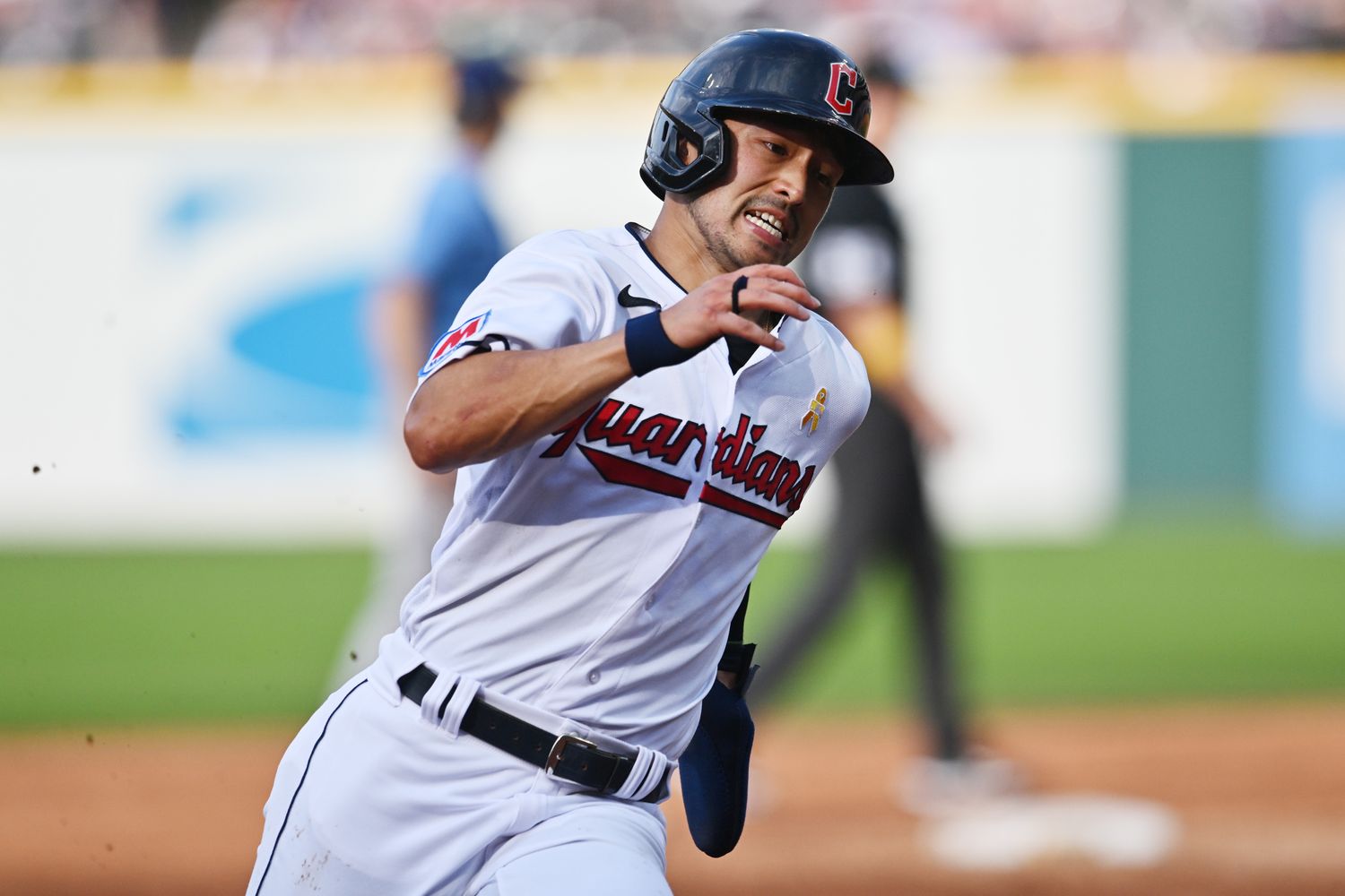 Sep 3, 2023; Cleveland, Ohio, USA; Cleveland Guardians left fielder Steven Kwan (38) rounds third base en route to scoring during the fifth inning against the Tampa Bay Rays at Progressive Field.