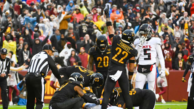 Washington Commanders defense following an interception against the Atlanta Falcons.