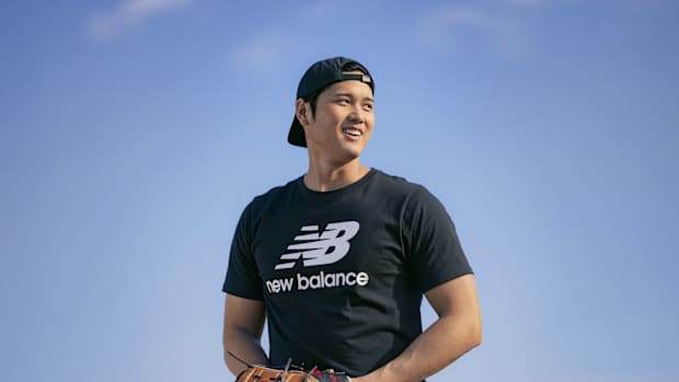 Shohei Ohtani stands on the pitcher's mound.