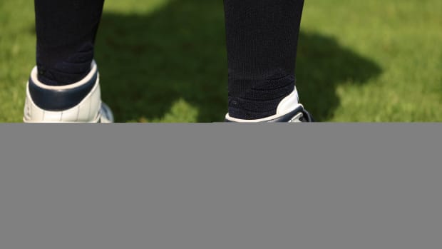 New York Yankees right fielder Alex Verdugo's white and Navy Air Jordan cleats.