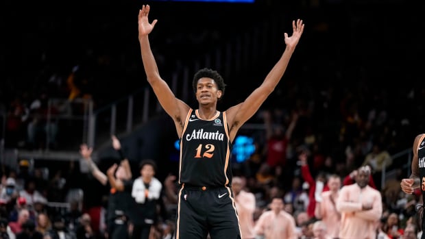 Atlanta Hawks forward De'Andre Hunter celebrates a made shot.