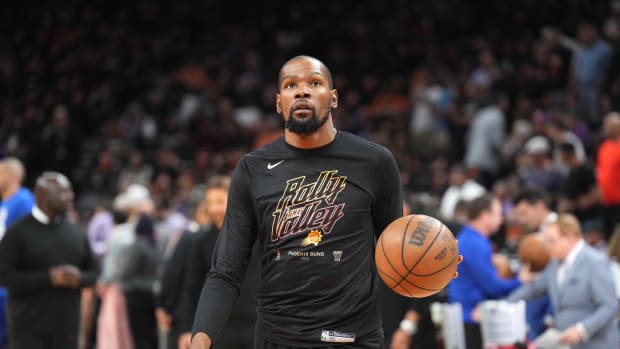 Phoenix Suns forward Kevin Durant warms up before a playoff game.