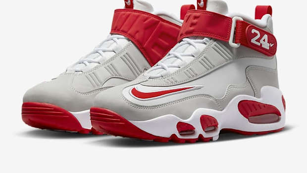 Side view of Ken Griffey Jr.'s red and grey Nike sneakers.