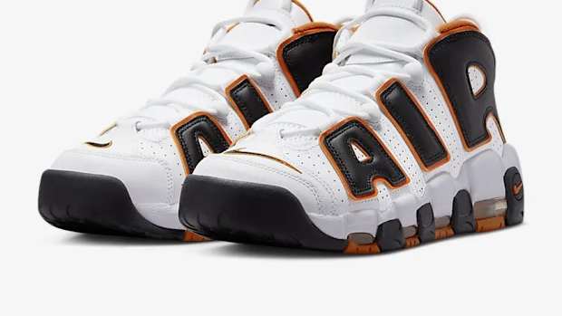 Side view of Scottie Pippen's white and black Nike sneakers.