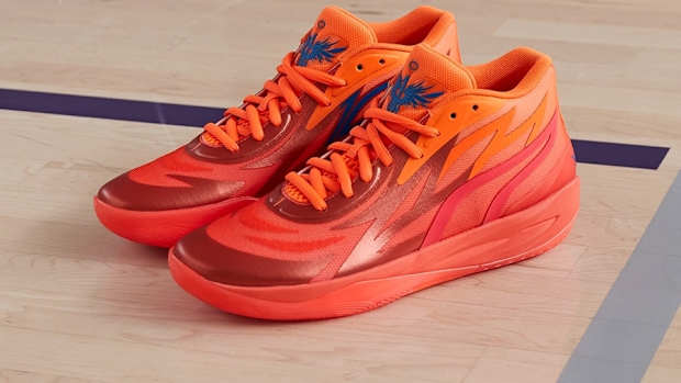 Red and orange Puma basketball shoes.