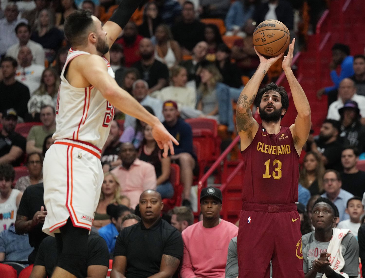 Mar 10, 2023; Miami, Florida, USA; Cleveland Cavaliers guard Ricky Rubio (13) takes a three-point shot as Miami Heat guard Max Strus (31) defends in the second half at Miami-Dade Arena. Mandatory Credit: Jim Rassol-USA TODAY Sports