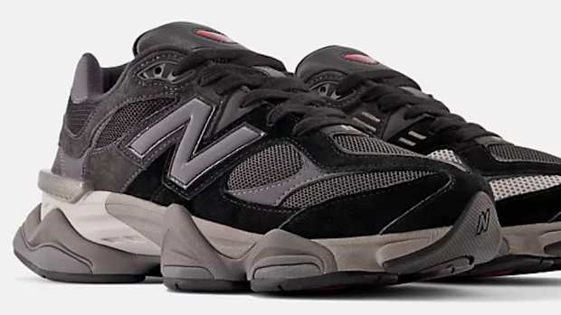 View of black and grey New Balance shoes.