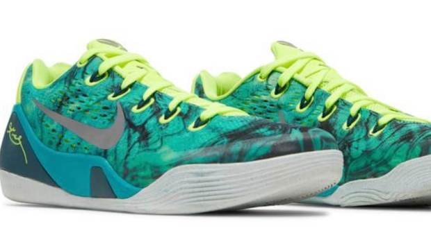 View of green and yellow Nike Kobe shoes.
