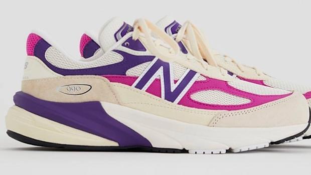 Side view of cream, pink, and purple New Balance shoes.