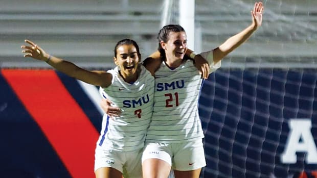 The SMU Mustangs' Eliana Salama and Leah Chancey celebrate a 3-0 shutout of Florida Atlantic to advance to the AAC championship game.