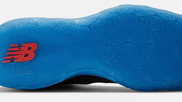 View of blue outsole of New Balance shoe.