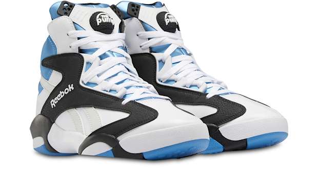 White, black, and blue Shaq Attaq shoes.