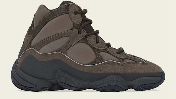 Side view of brown and black Yeezy boot.