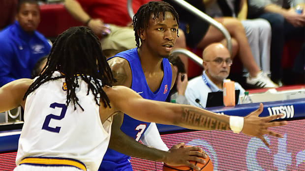 SMU guard Chuck Harris looks to move the ball against Western Illinois.