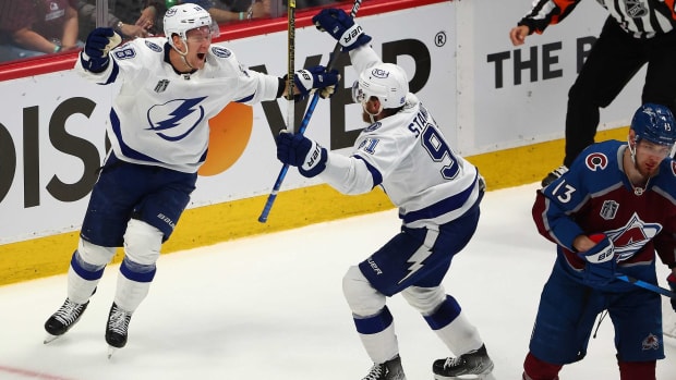 Ondrej Palat and Steven Stamkos celebrate a Lightning goal vs. Colorado.