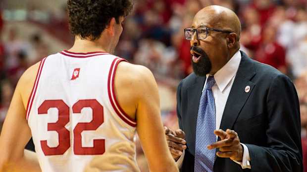 Indiana Head Coach Mike Woodson talks with Trey Galloway (32) during the second half of the Indiana versus Nebraska men's basketball game at Simon Skjodt Assembly Hall on Wednesday, Feb. 21, 2024.