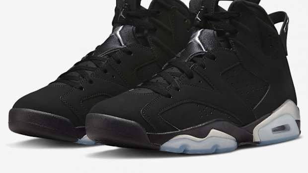 Black and silver Air Jordan shoes.