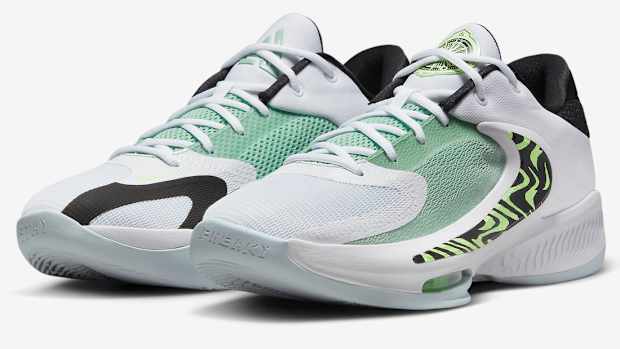 View of Nike Zoom Freak 4 shoes in white, volt, black colors.