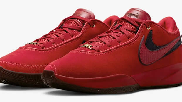 View of red Nike LeBron shoes.